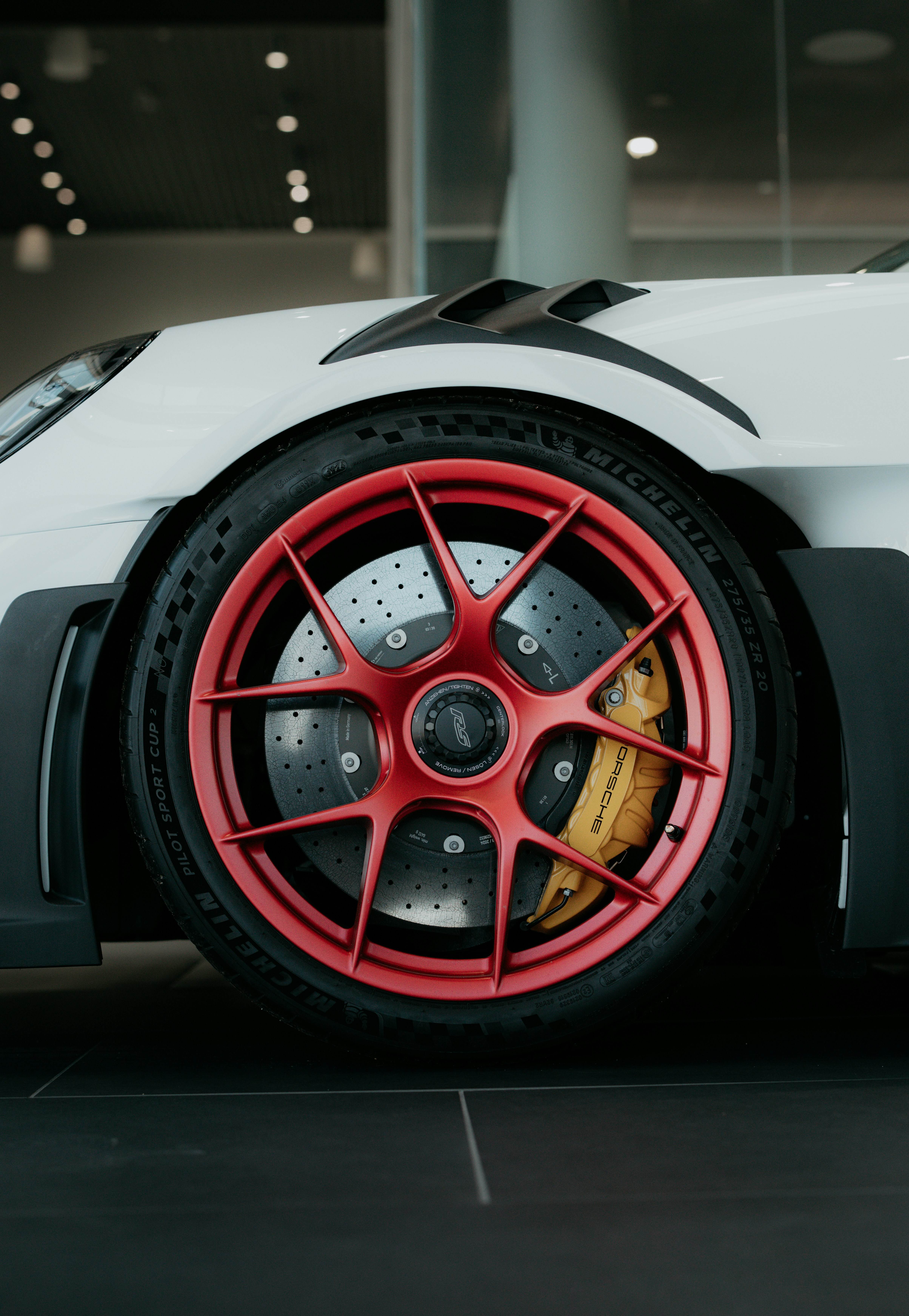 Sports car wheel with red rim
